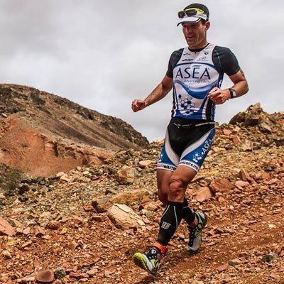 Cody Waite - ASEA Elite Xterra Triathlete shown running down rough terrain
